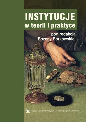 Okładka w zielonej tonacji przedstawia obraz z ręką liczącą monety na stole. Obok widać ozdobne naczynie, rulon banknotów i sakiewkę z perłami. Na dole znajduje się logo Wydawnictwa UEW