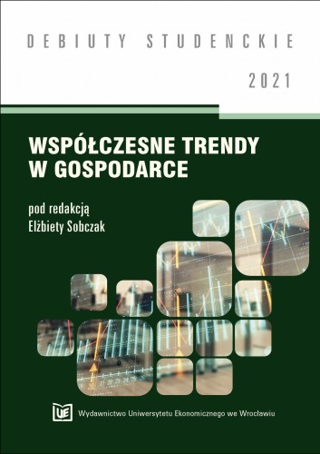 Okładka książki „Współczesne trendy w gospodarce” ma ciemnozielone tło, kolaż wykresów giełdowych w oknach o zaokrąglonych rogach oraz biały tytuł. U góry napis „Debiuty Studenckie 2021”.